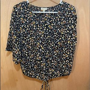 Black and brown pocketed top